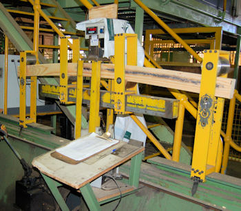 Proof grader in a sawmill